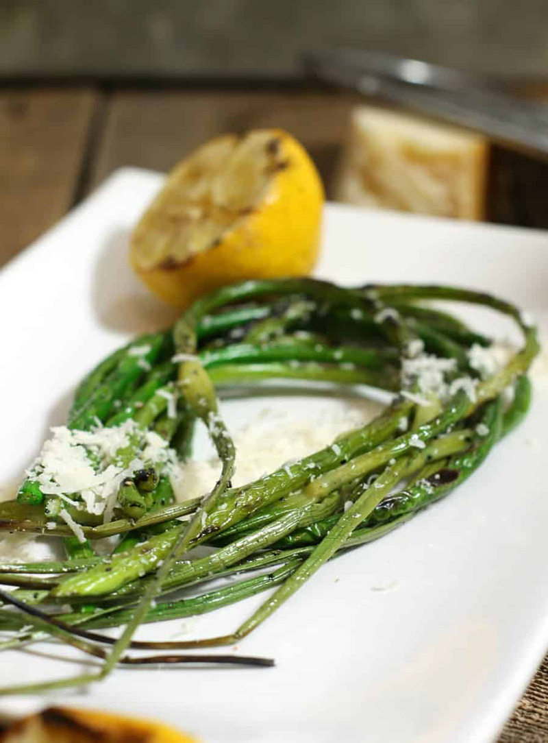 Grilled Garlic Scapes with Lemon and Parmesan