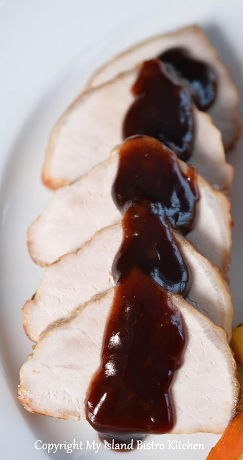 Pork Loin Roast with Pomegranate, Red Wine and Black Garlic Sauce