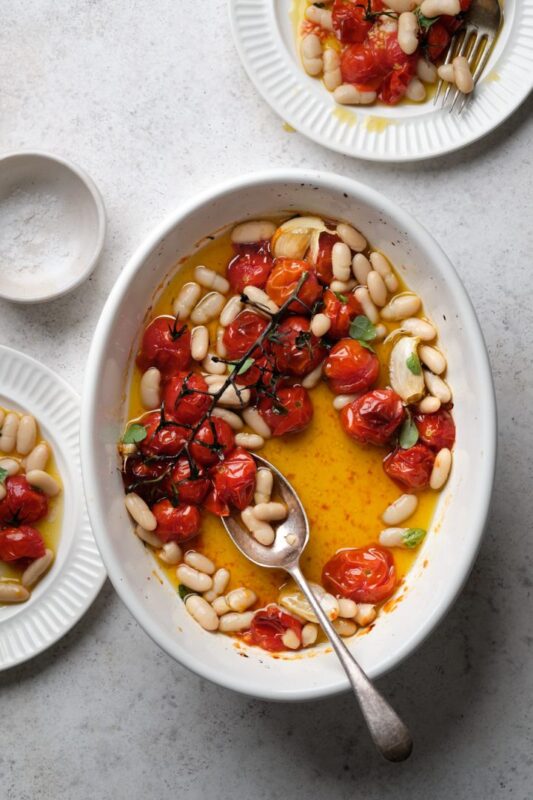 Roasted cherry tomatoes with white beans